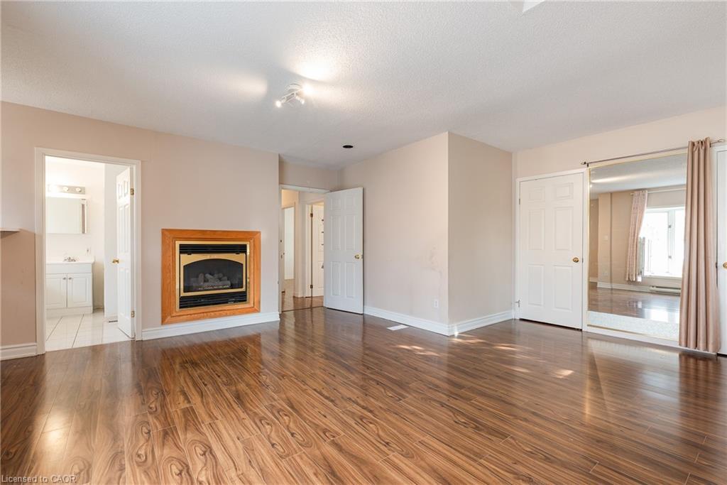 1242 Rebecca Street, Oakville, ON - Indoor Photo Showing Living Room With Fireplace