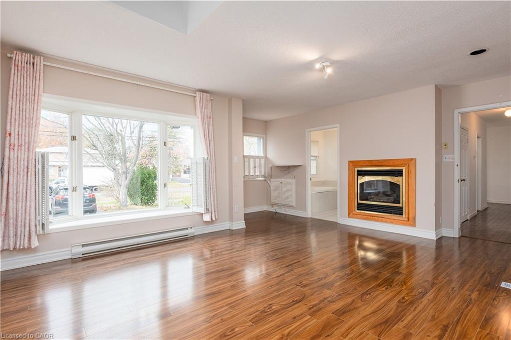 1242 Rebecca Street, Oakville, ON - Indoor Photo Showing Living Room With Fireplace