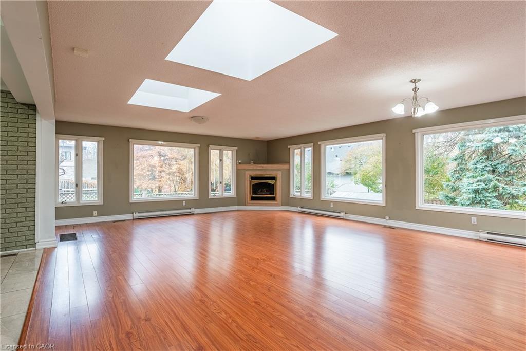 1242 Rebecca Street, Oakville, ON - Indoor Photo Showing Living Room With Fireplace