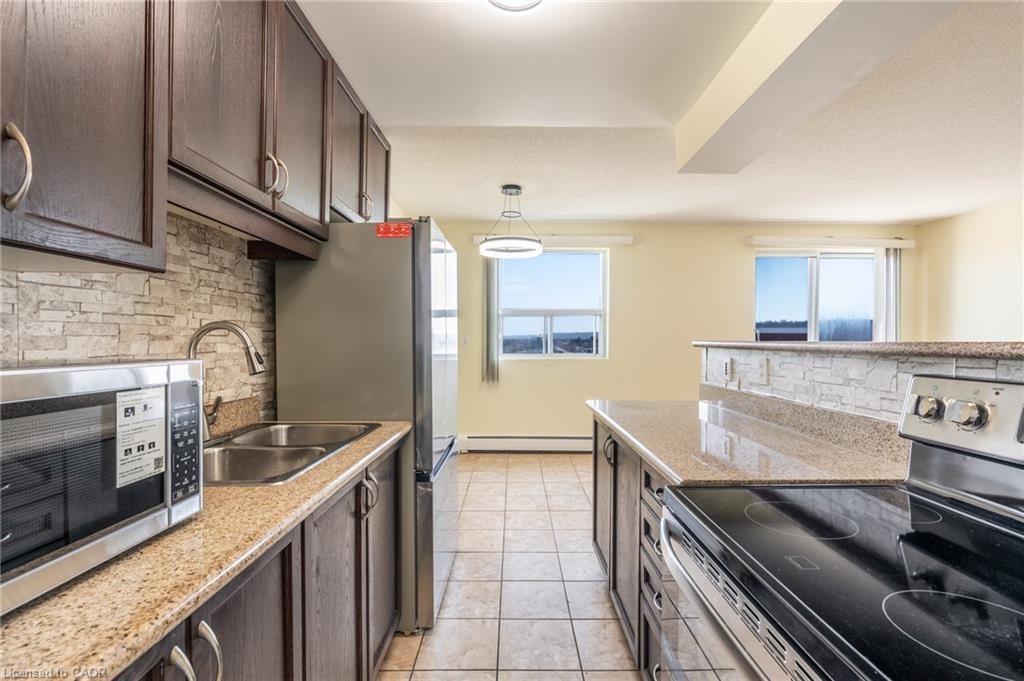 803-851 Queenston Road, Hamilton, ON - Indoor Photo Showing Kitchen With Double Sink