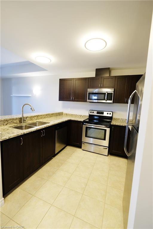 302-2 Colonial Drive, Guelph, ON - Indoor Photo Showing Kitchen With Stainless Steel Kitchen With Double Sink