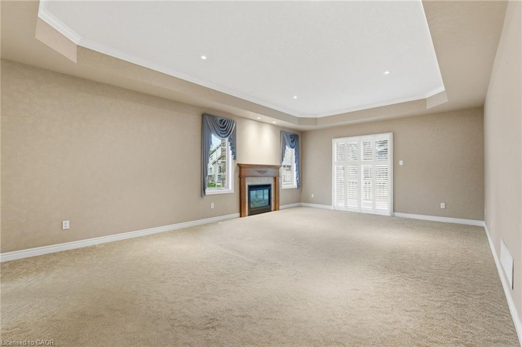 51-34 Southbrook Drive, Binbrook, ON - Indoor With Fireplace