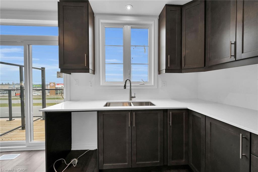 35-120 Court Drive, Paris, ON - Indoor Photo Showing Kitchen With Double Sink