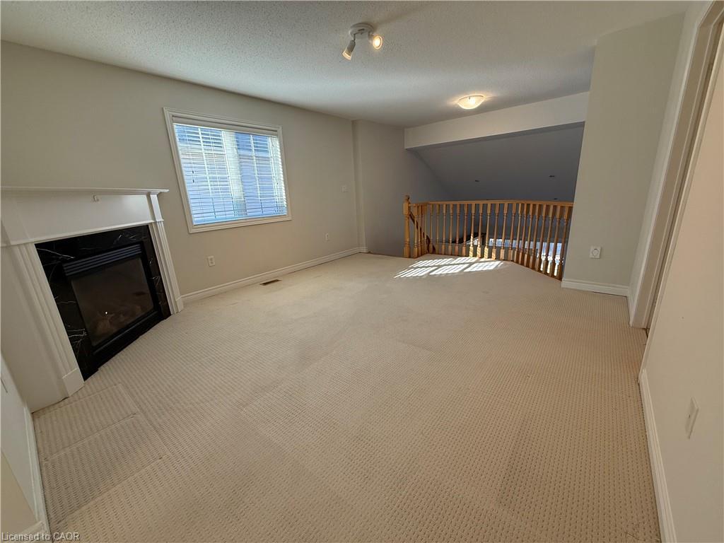 4210 Saunders Crescent, Burlington, ON - Indoor Photo Showing Other Room With Fireplace