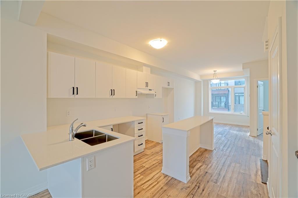 114-155 Equestrian Way, Cambridge, ON - Indoor Photo Showing Kitchen With Double Sink