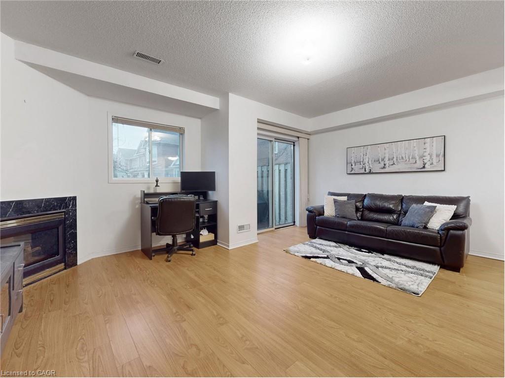 107-1480 Britannia Road W, Mississauga, ON - Indoor Photo Showing Living Room With Fireplace