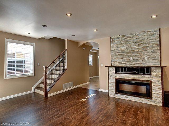 Upper Level-330 Elliott Street W, Windsor, ON - Indoor Photo Showing Living Room With Fireplace