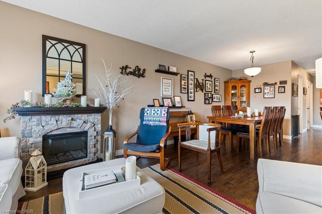 1123 Pearson Drive, Woodstock, ON - Indoor Photo Showing Living Room With Fireplace