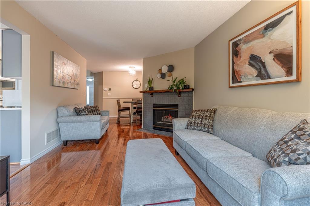 13-2230 Walkers Line, Burlington, ON - Indoor Photo Showing Living Room With Fireplace