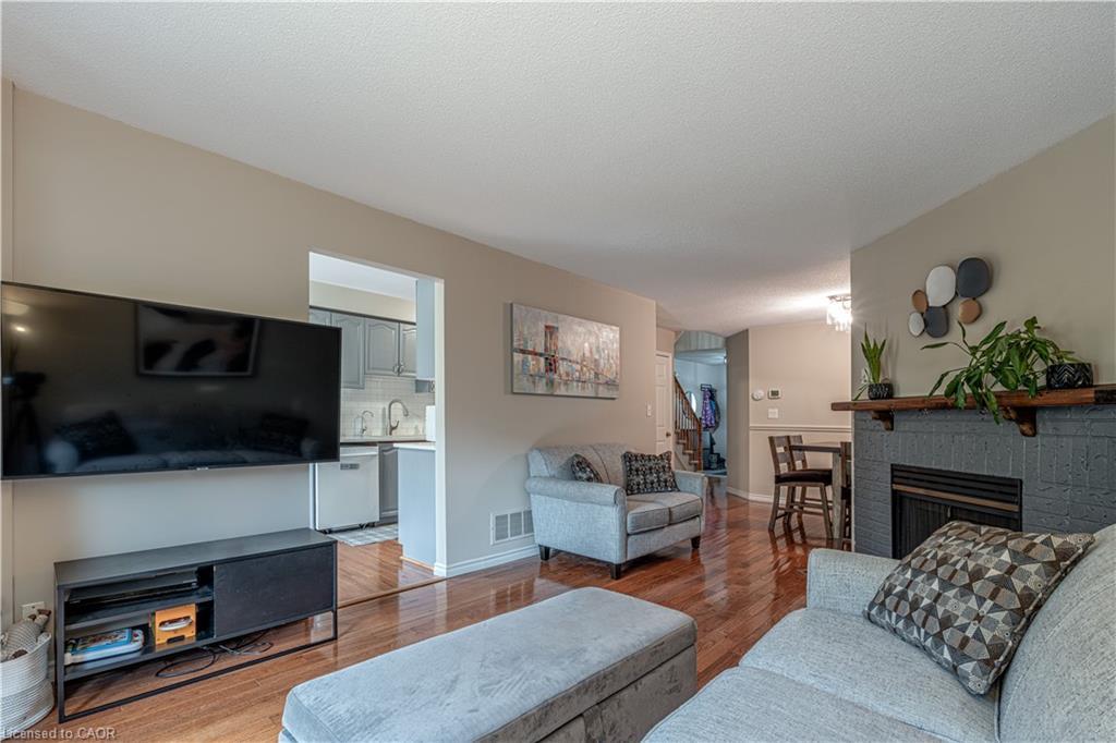 13-2230 Walkers Line, Burlington, ON - Indoor Photo Showing Living Room With Fireplace