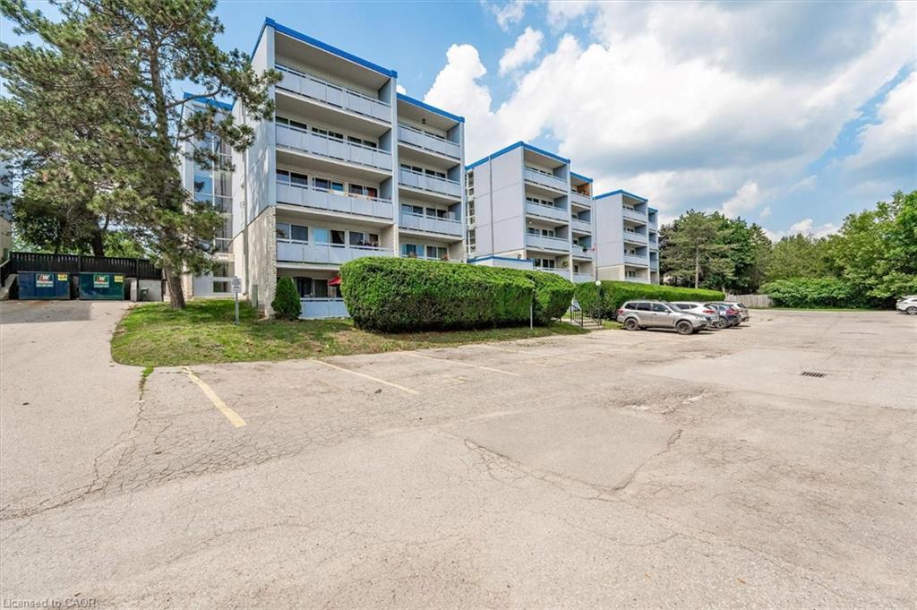 102-105 Conroy Crescent, Guelph, ON - Outdoor With Balcony With Facade