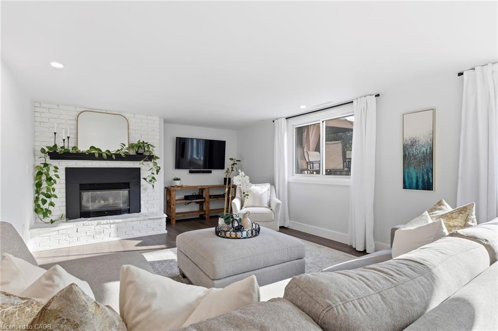 34 Dora Drive, Simcoe, ON - Indoor Photo Showing Living Room With Fireplace