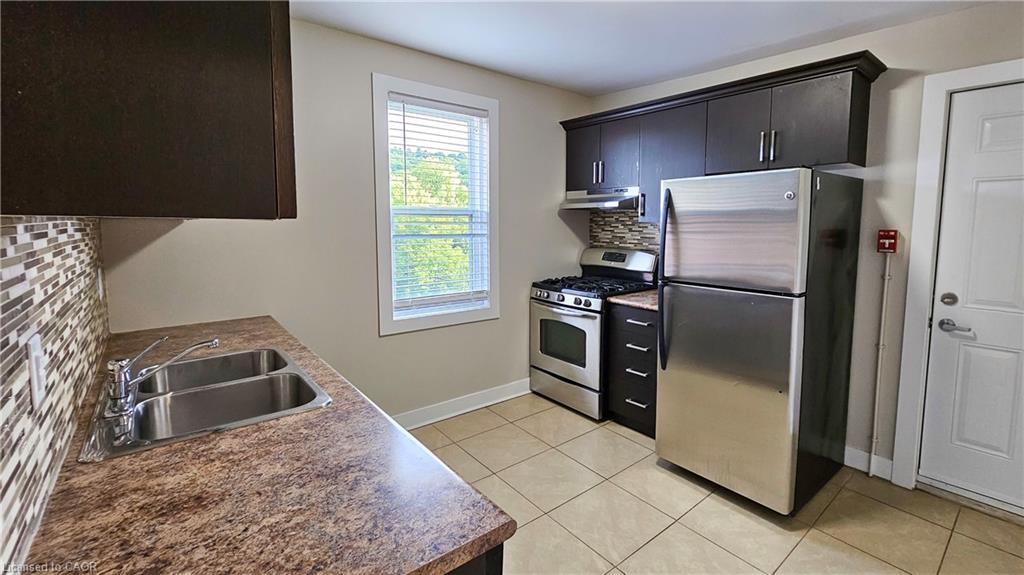 403-1544 King Street E, Hamilton, ON - Indoor Photo Showing Kitchen With Stainless Steel Kitchen With Double Sink