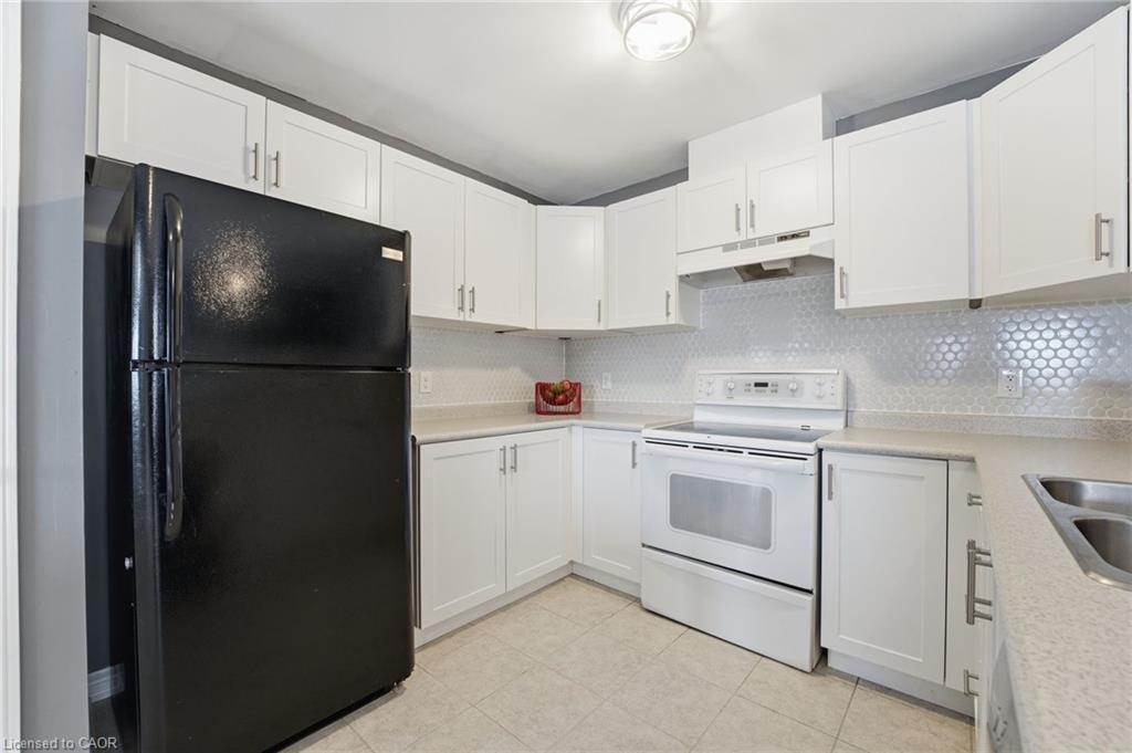 415 Krotz Street W, Listowel, ON - Indoor Photo Showing Kitchen With Double Sink
