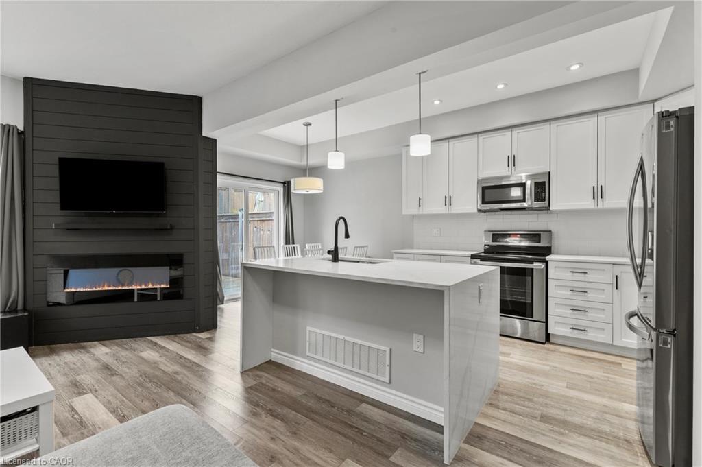 11 Dennis Drive, Smithville, ON - Indoor Photo Showing Kitchen With Fireplace With Stainless Steel Kitchen With Upgraded Kitchen