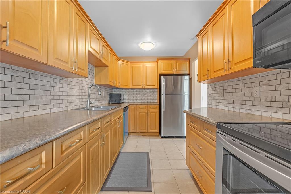 402-1966 Main Street W, Hamilton, ON - Indoor Photo Showing Kitchen With Double Sink