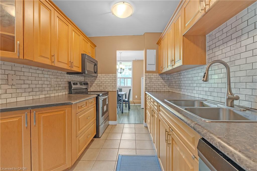 402-1966 Main Street W, Hamilton, ON - Indoor Photo Showing Kitchen With Double Sink