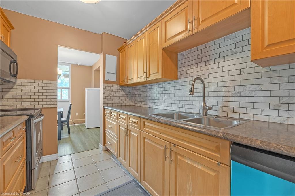 402-1966 Main Street W, Hamilton, ON - Indoor Photo Showing Kitchen With Double Sink