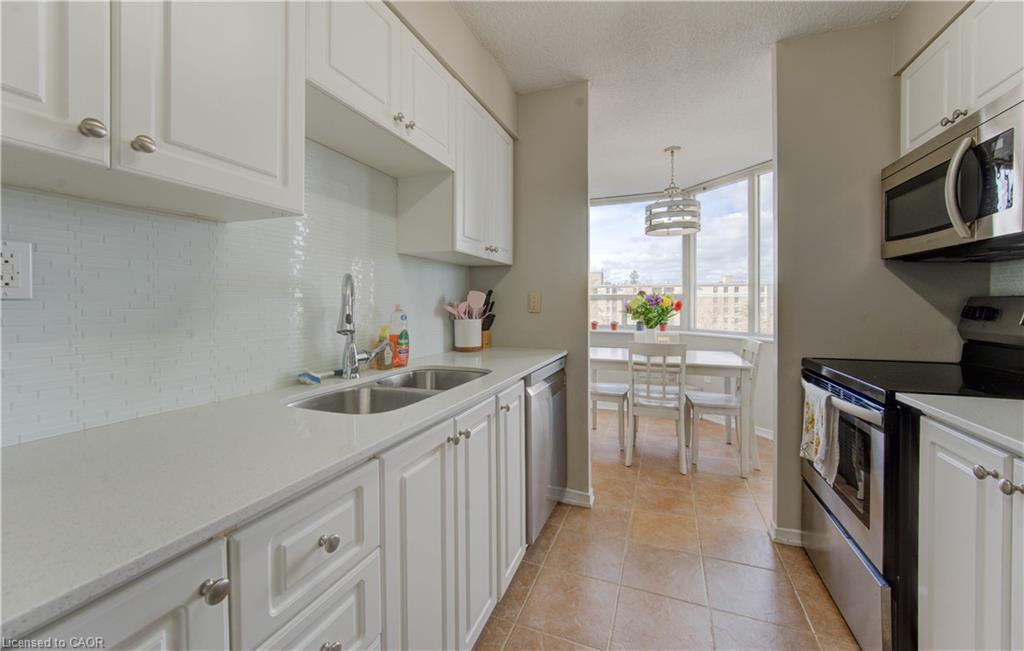 710-3227 King Street E, Kitchener, ON - Indoor Photo Showing Kitchen With Double Sink