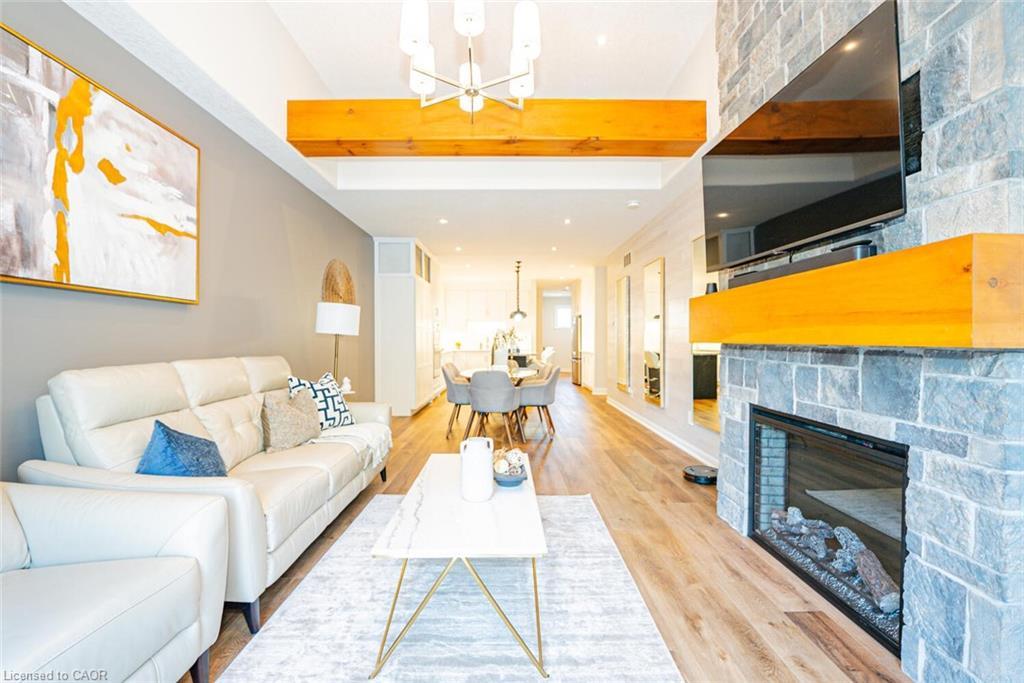11-2848 King Street, Lincoln, ON - Indoor Photo Showing Living Room With Fireplace