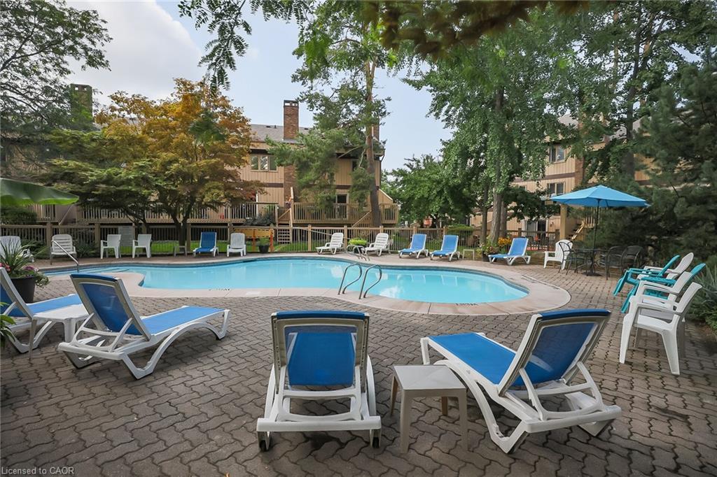 21-178 Scott Street, St. Catharines, ON - Outdoor With In Ground Pool With Deck Patio Veranda With Backyard