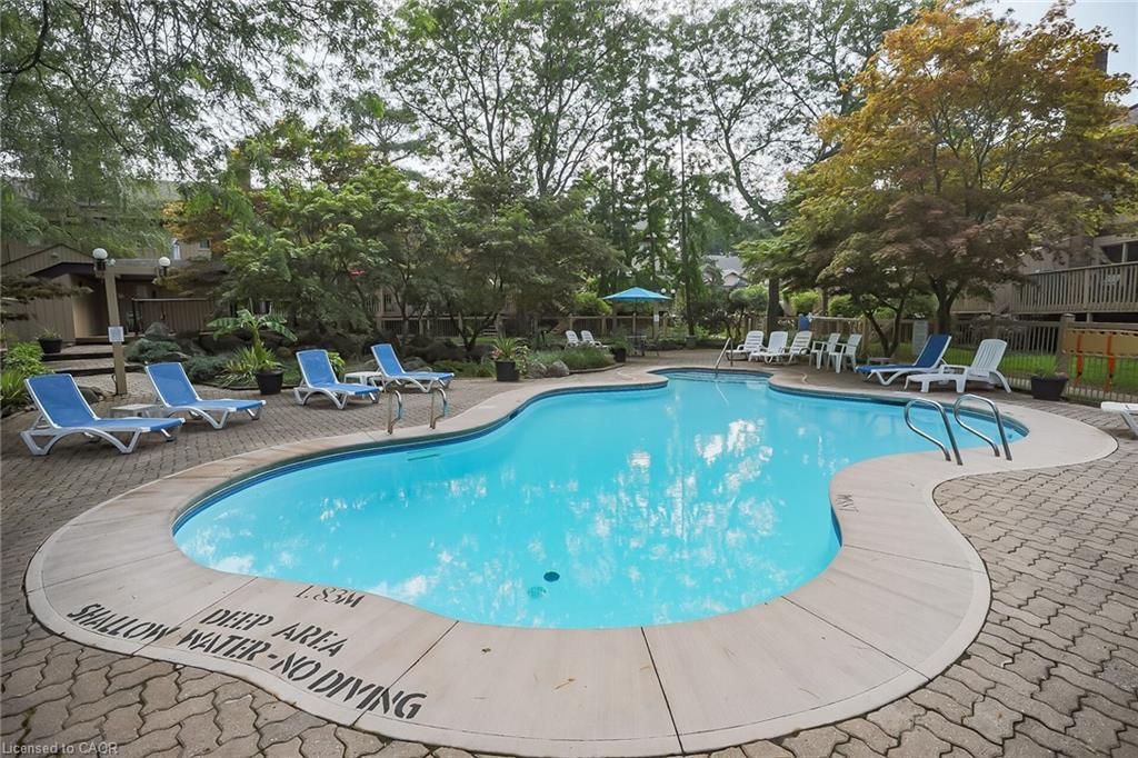 21-178 Scott Street, St. Catharines, ON - Outdoor With In Ground Pool With Deck Patio Veranda With Backyard