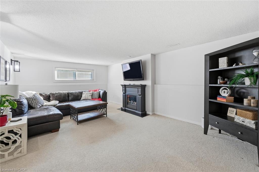 123 Athenia Drive, Stoney Creek, ON - Indoor Photo Showing Living Room With Fireplace