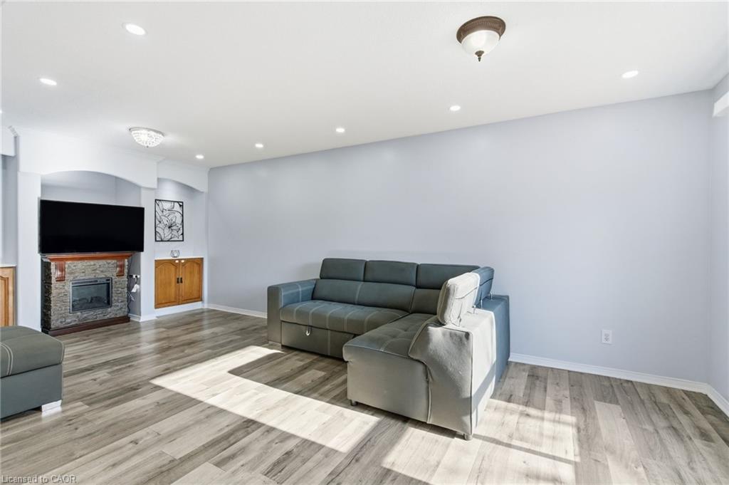 2 Racalmuto Street, Hamilton, ON - Indoor Photo Showing Living Room With Fireplace
