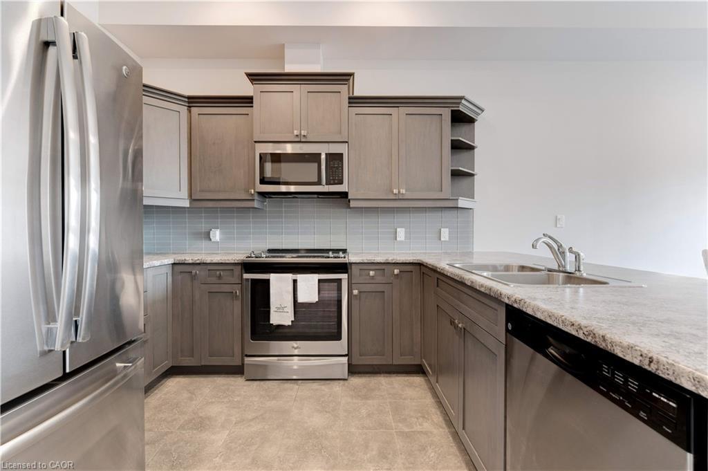 106-3290 New Street, Burlington, ON - Indoor Photo Showing Kitchen With Stainless Steel Kitchen With Double Sink