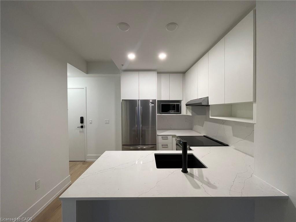 705-206 King Street W, Hamilton, ON - Indoor Photo Showing Kitchen With Double Sink