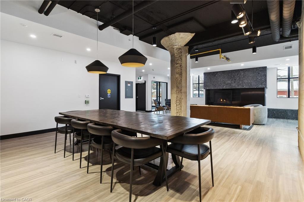 221-120 Huron Street, Guelph, ON - Indoor Photo Showing Dining Room With Fireplace