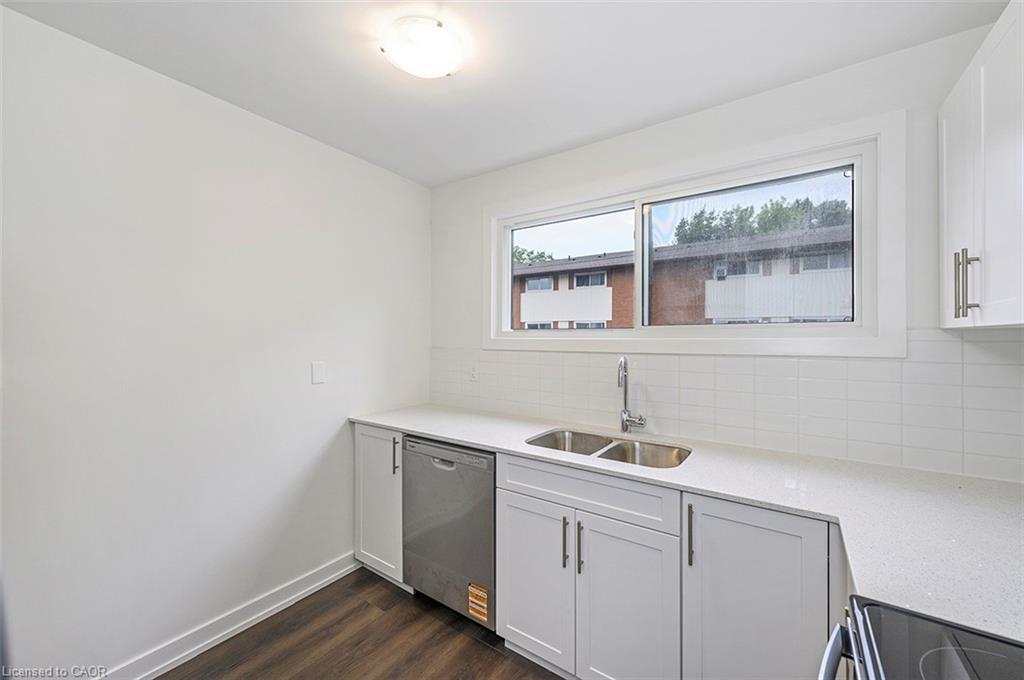 59 Woodman Drive, Hamilton, ON - Indoor Photo Showing Kitchen With Double Sink