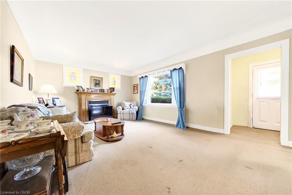 9037 Airport Road W, Hamilton, ON - Indoor Photo Showing Living Room With Fireplace