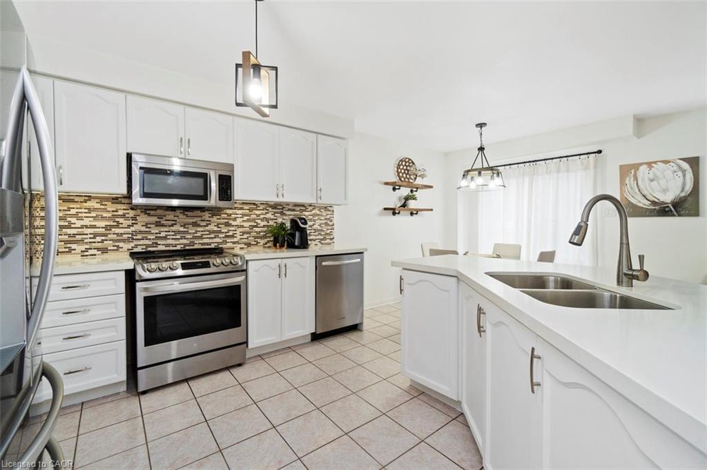 11 Redfinch Way, Brampton, ON - Indoor Photo Showing Kitchen With Stainless Steel Kitchen With Double Sink With Upgraded Kitchen