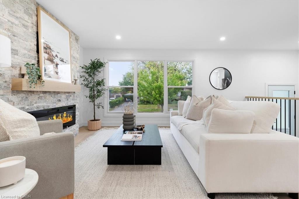 15 Mellenby Street, Hamilton, ON - Indoor Photo Showing Living Room With Fireplace
