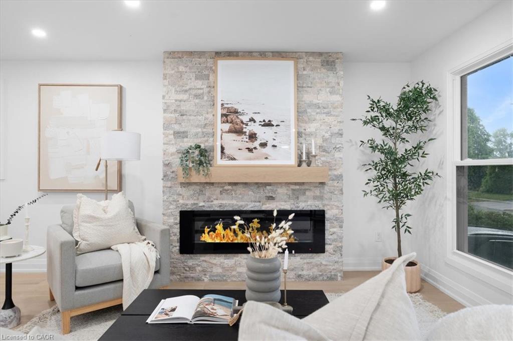 15 Mellenby Street, Hamilton, ON - Indoor Photo Showing Living Room With Fireplace