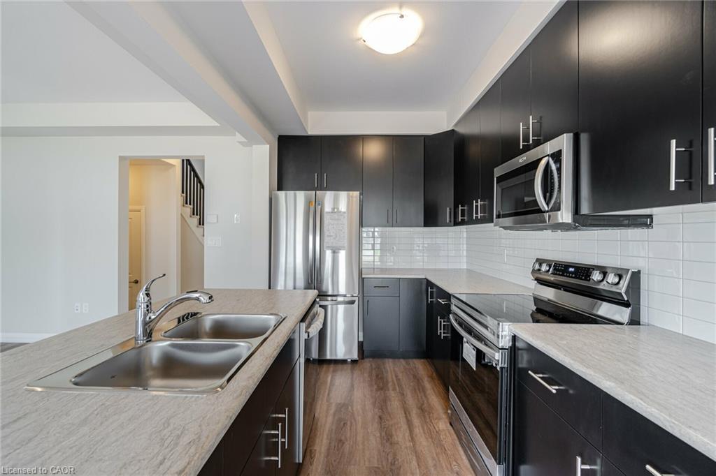 7310 Marvel Drive, Niagara Falls, ON - Indoor Photo Showing Kitchen With Stainless Steel Kitchen With Double Sink With Upgraded Kitchen