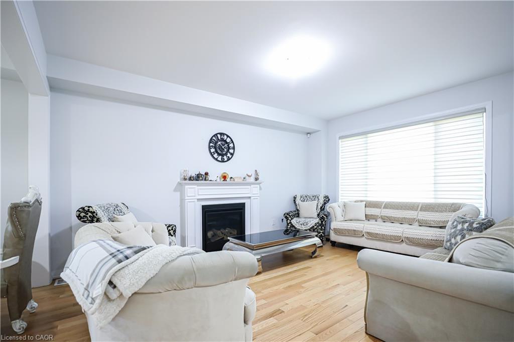 125 Silverwood Crescent, Woodstock, ON - Indoor Photo Showing Living Room With Fireplace