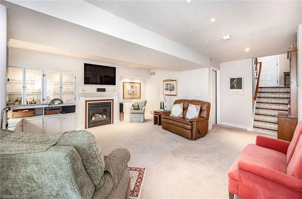4-2871 Darien Road, Burlington, ON - Indoor Photo Showing Living Room With Fireplace