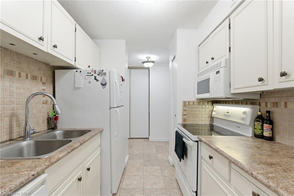 502-222 Jackson Street W, Hamilton, ON - Indoor Photo Showing Kitchen With Double Sink