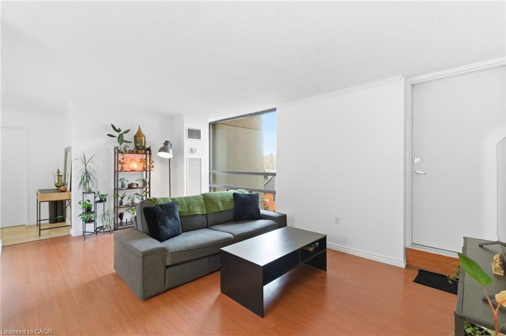 502-222 Jackson Street W, Hamilton, ON - Indoor Photo Showing Living Room With Fireplace