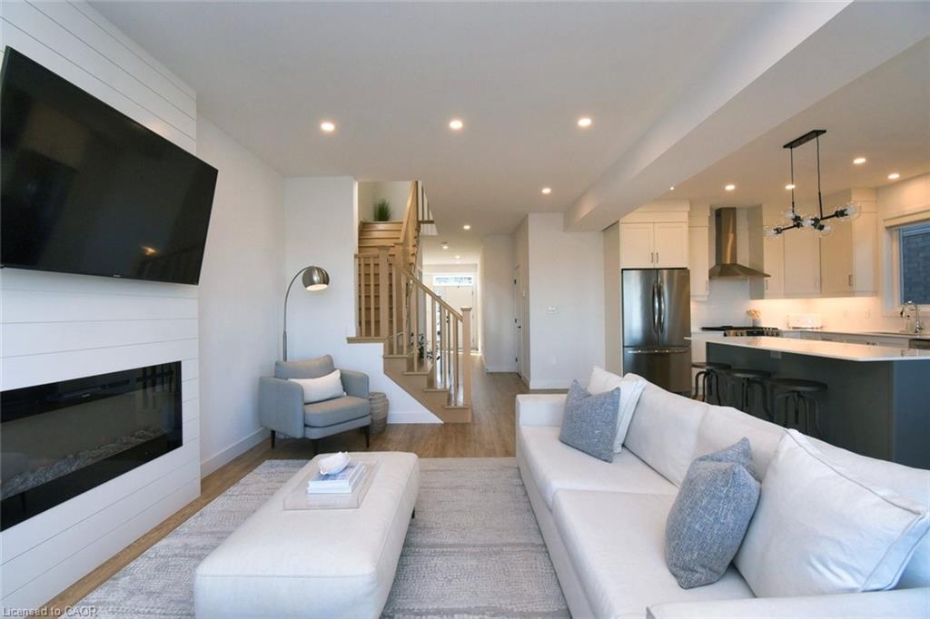100 Bedrock Drive, Hamilton, ON - Indoor Photo Showing Living Room With Fireplace