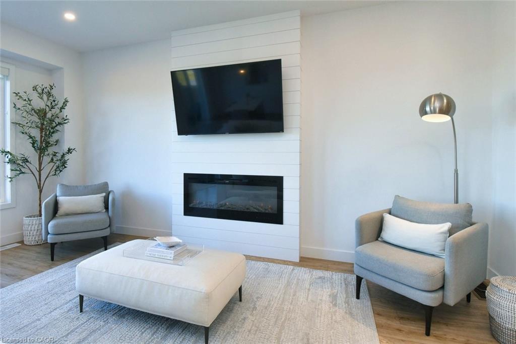 100 Bedrock Drive, Hamilton, ON - Indoor Photo Showing Living Room With Fireplace