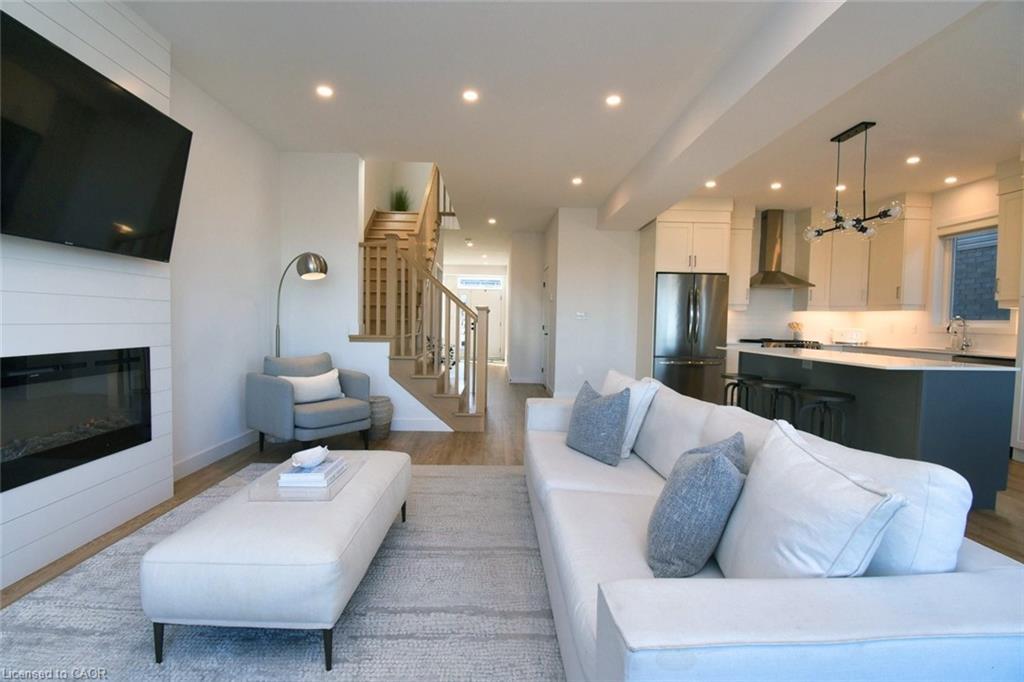 100 Bedrock Drive, Hamilton, ON - Indoor Photo Showing Living Room With Fireplace