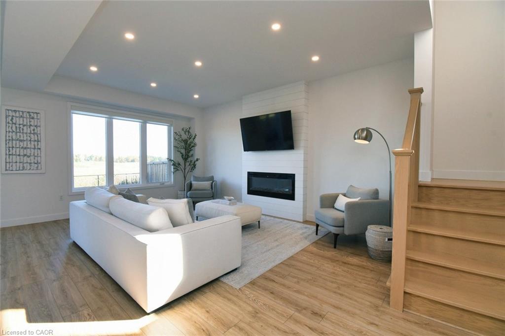 100 Bedrock Drive, Hamilton, ON - Indoor Photo Showing Living Room With Fireplace