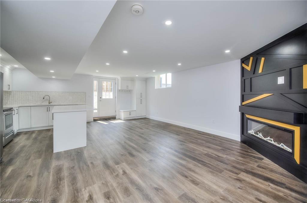 Lower-550 Rush Meadow Crescent, Kitchener, ON - Indoor With Fireplace