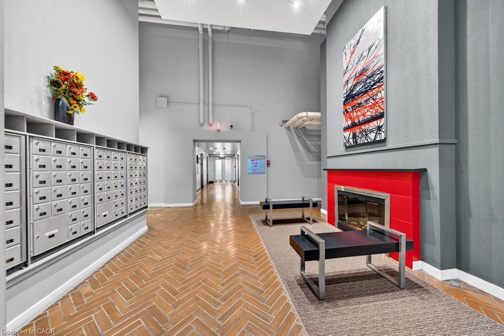 502-66 Bay Street S, Hamilton, ON - Indoor Photo Showing Other Room With Fireplace