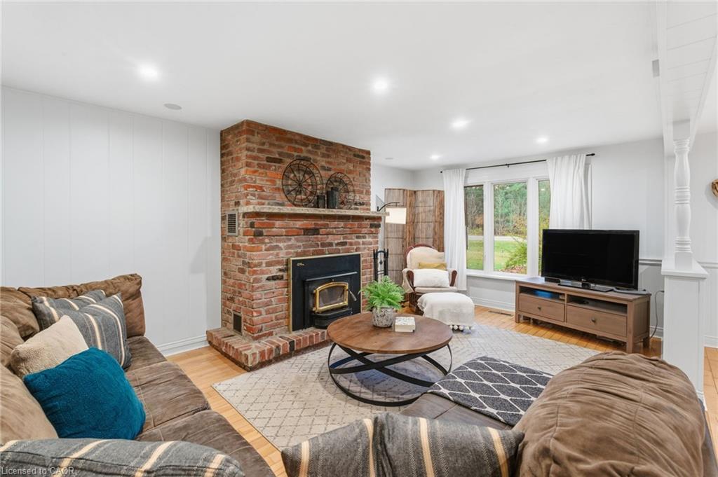 945 Regional Road 97, Puslinch, ON - Indoor Photo Showing Living Room With Fireplace