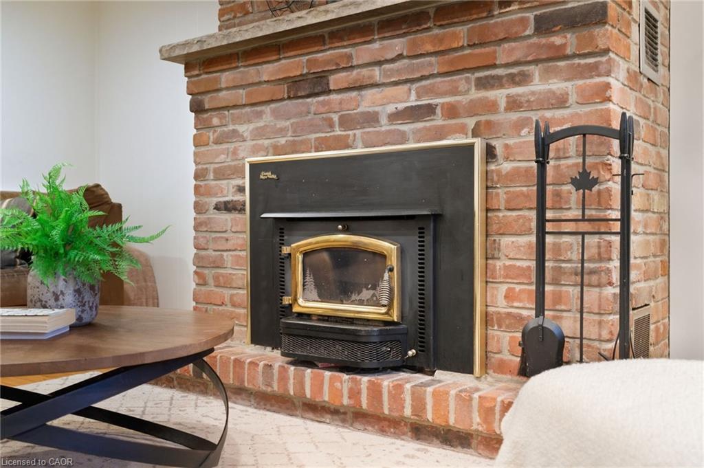 945 Regional Road 97, Puslinch, ON - Indoor Photo Showing Living Room With Fireplace