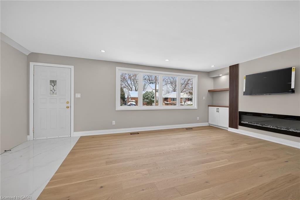 84 Blanmora Drive, Hamilton, ON - Indoor Photo Showing Other Room With Fireplace